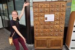 Student auctioned catalog cabinet for a donation for charity