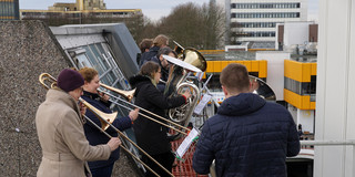 Brass players play Christmas carols from the UB roof (5)