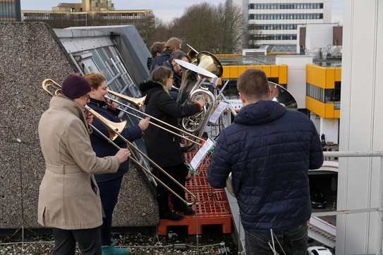Brass players play Christmas carols from the UB roof (5)