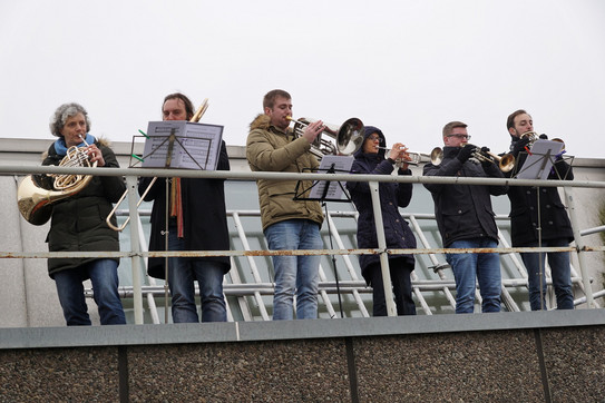 Brass players play Christmas carols