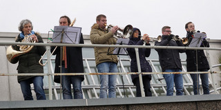 Brass players play Christmas carols