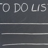 List titled "To Do List" written on a chalkboard.
